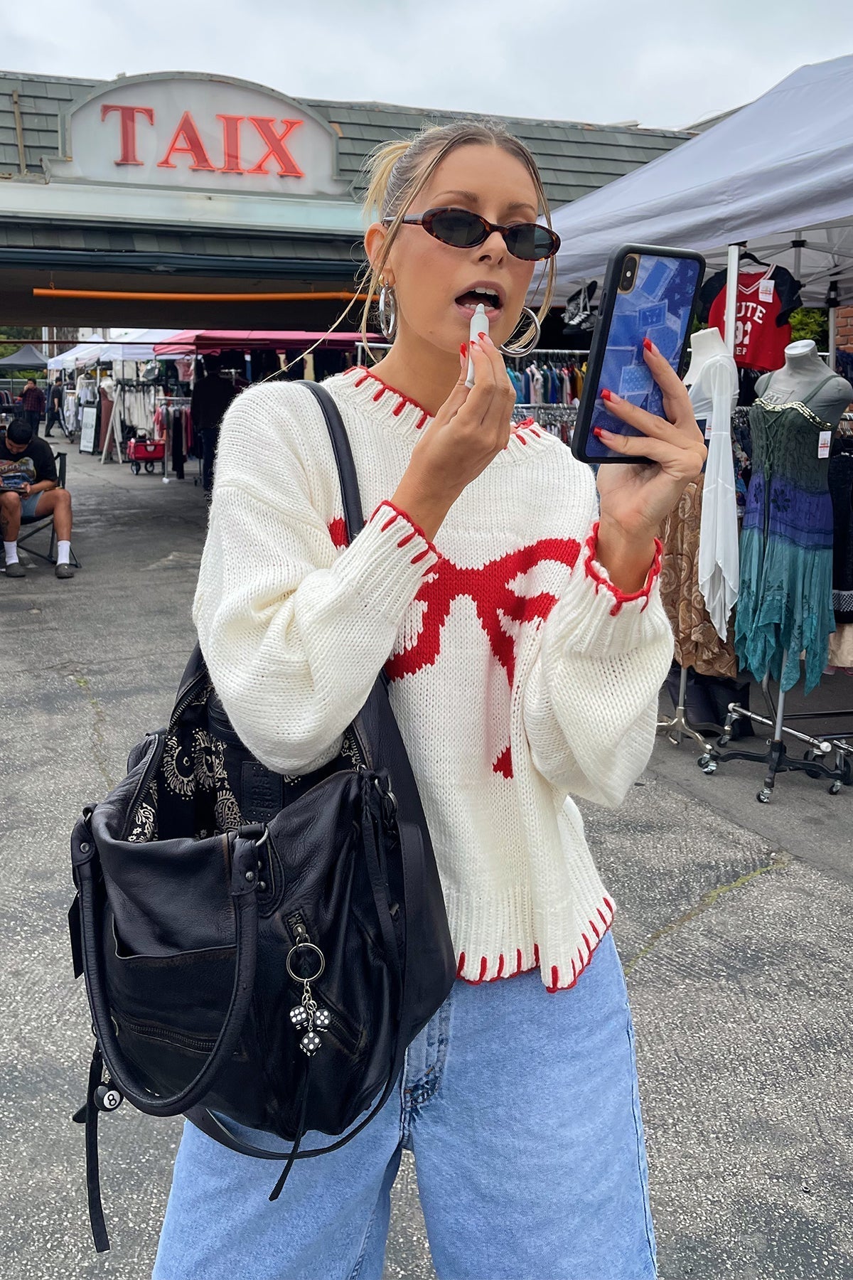 Maglia Chic con Fiocco Rosso