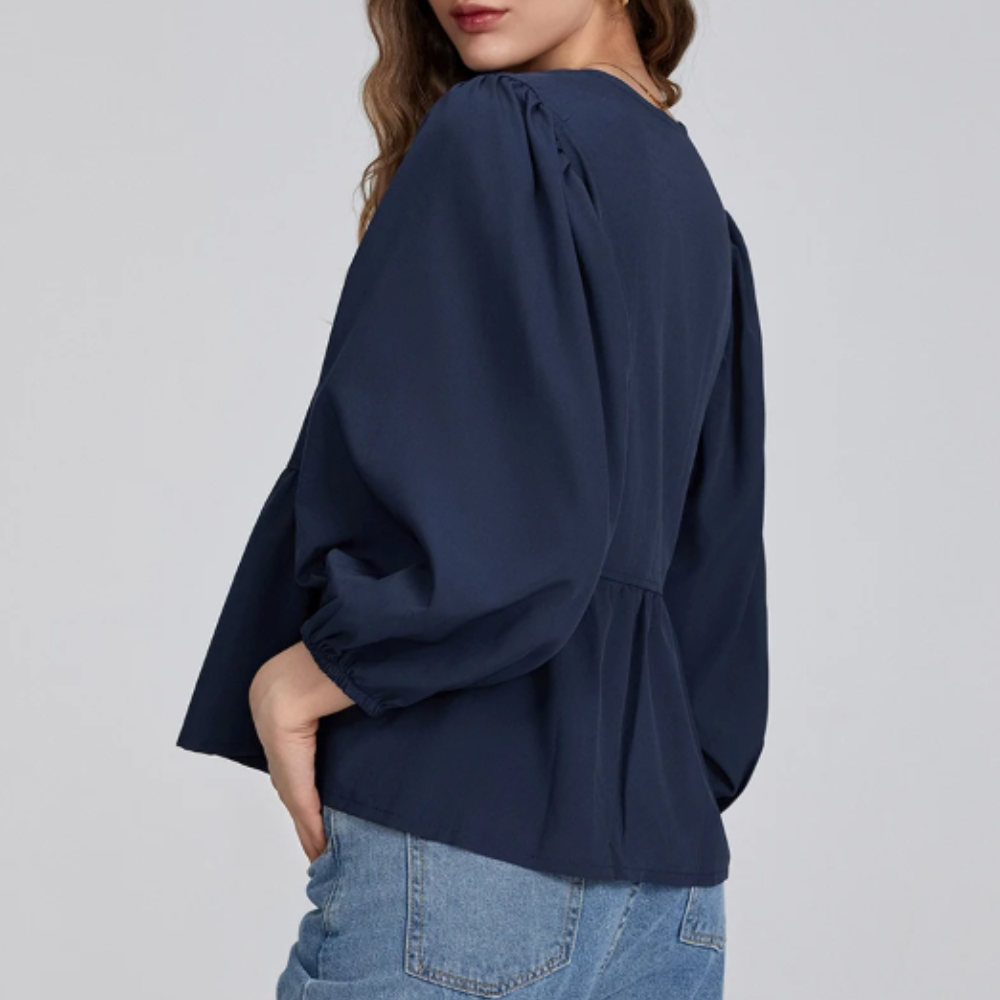 Blusa Elegante con Fiocco e Orlo Peplum – Maniche Tre Quarti