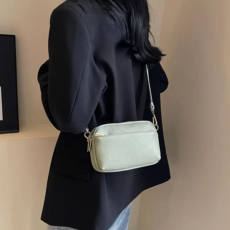 Borsa a tracolla geometrica