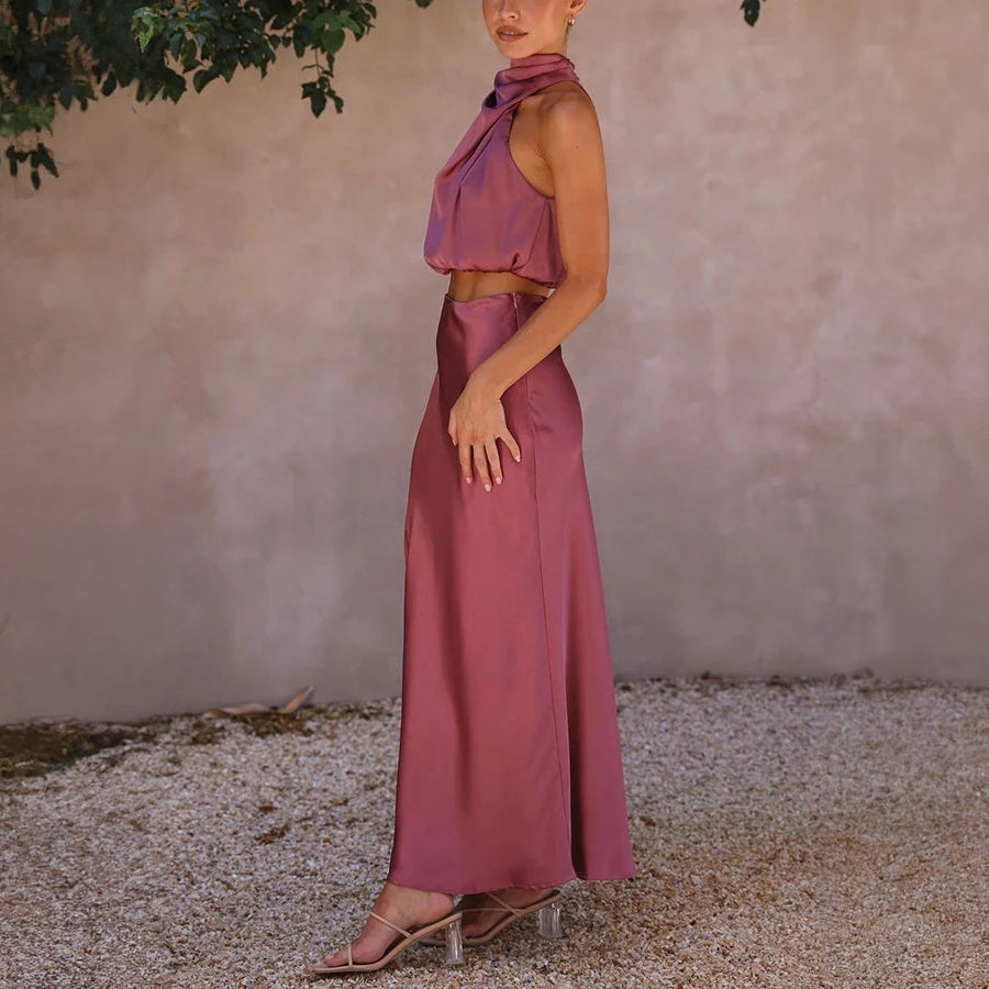 Abito Elegante con Top Halter e Gonna Fluttuante