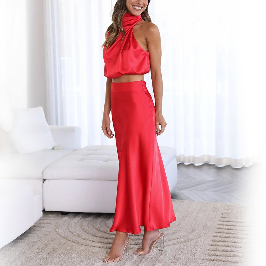 Abito Elegante con Top Halter e Gonna Fluttuante