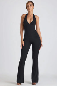 Tuta Fasciante a Costine – Scollo Halter e Gamba Svasata