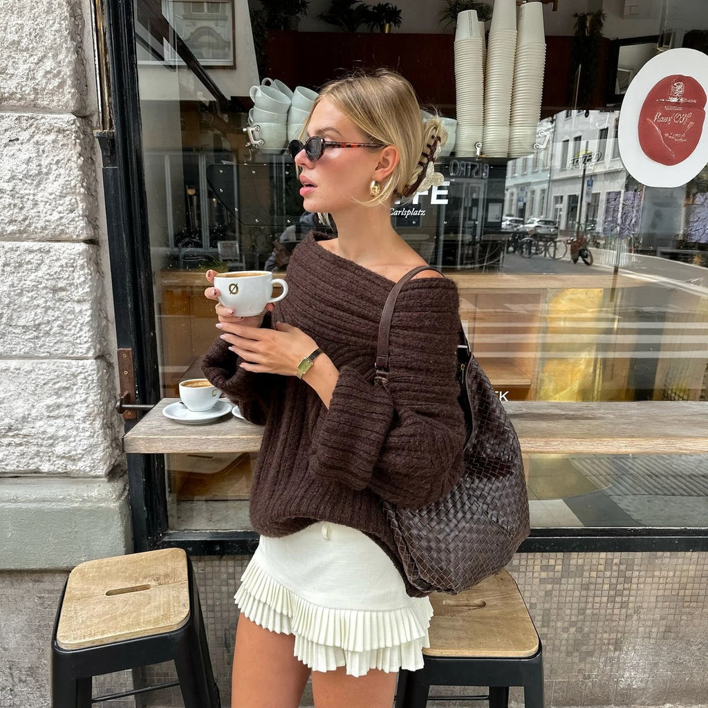 Top asimmetrico con maniche a palloncino