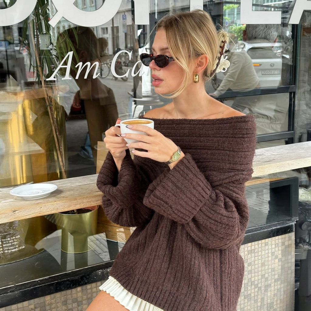 Top asimmetrico con maniche a palloncino