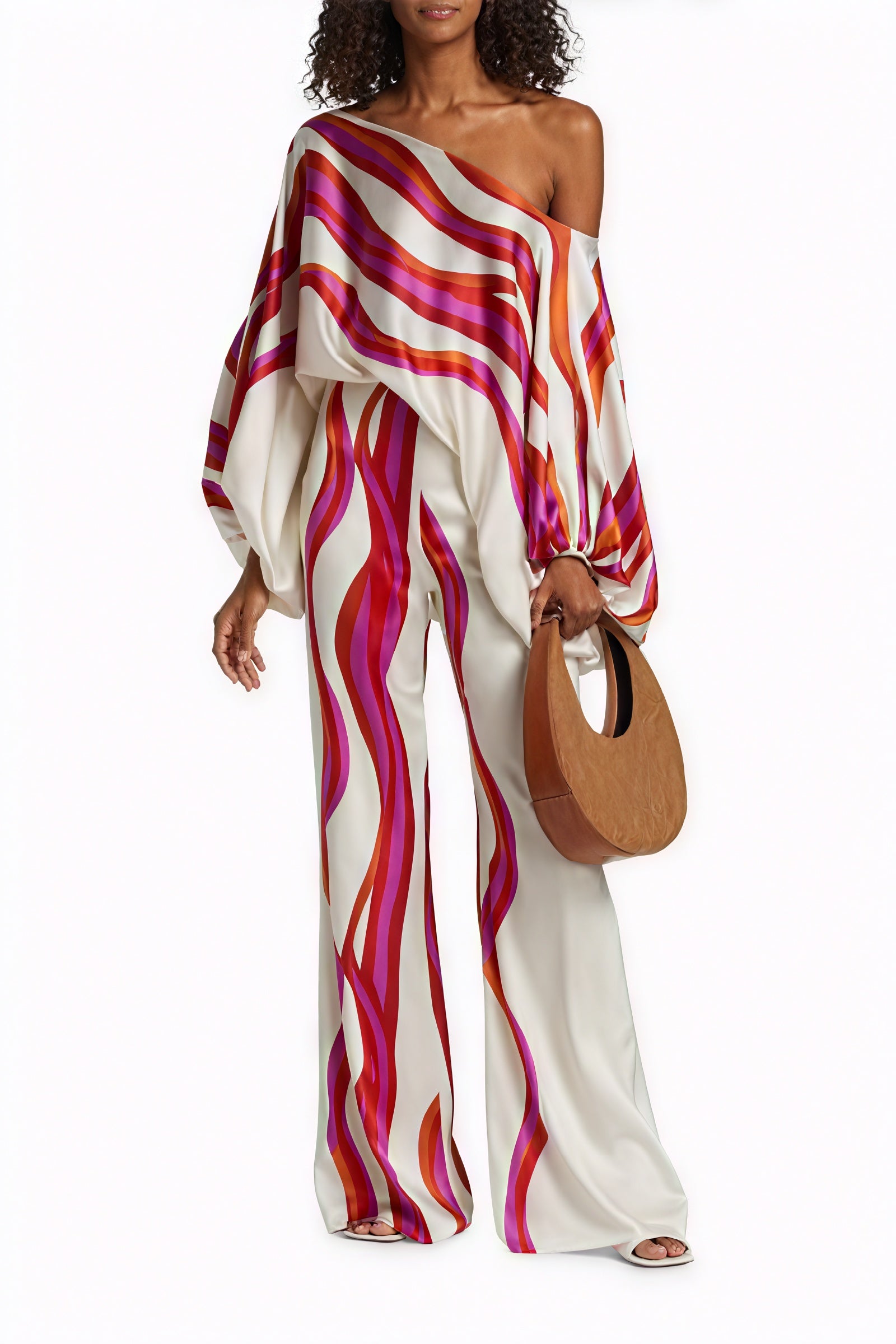 Top Asimmetrico con Manica Voluminosa