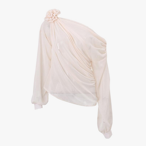 Top asimmetrico con dettaglio rosa