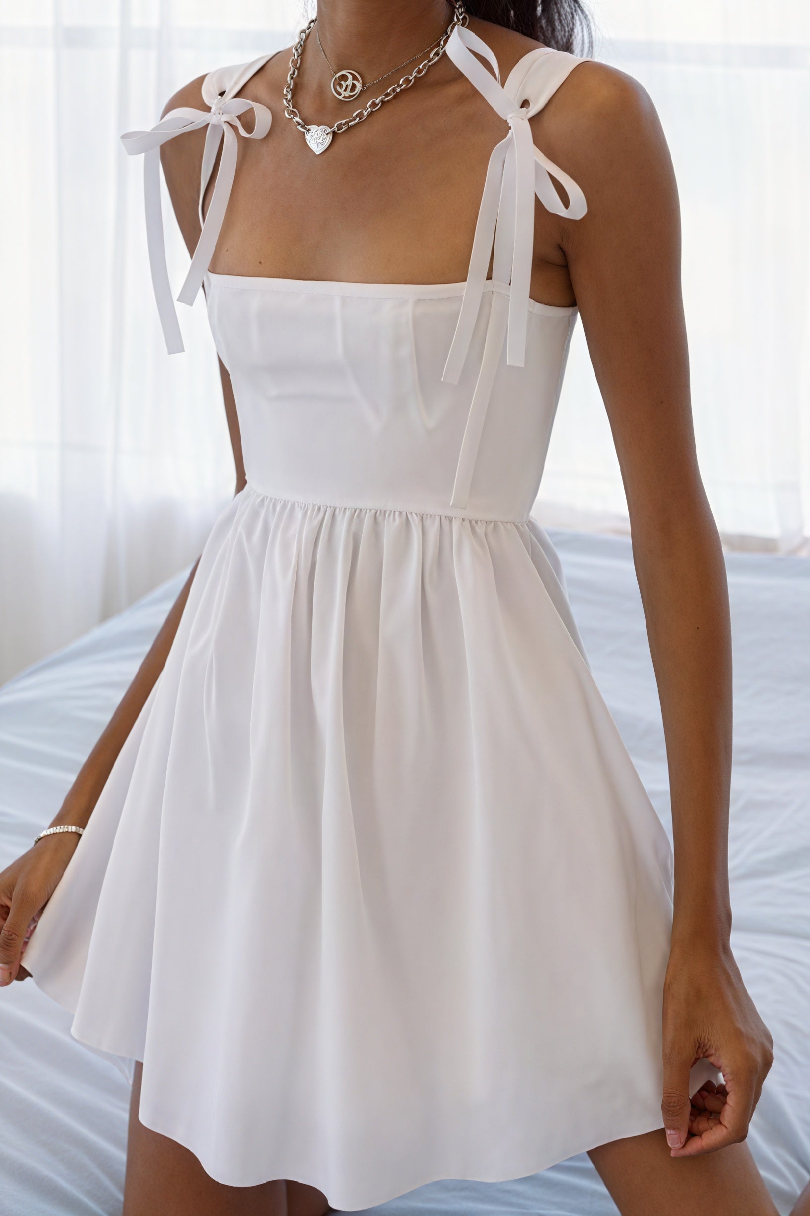 Mini Abito con Fiocchi