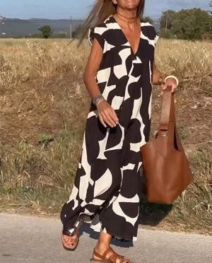 Abito Lungo con Motivo Astratto: Eleganza Disinvolta