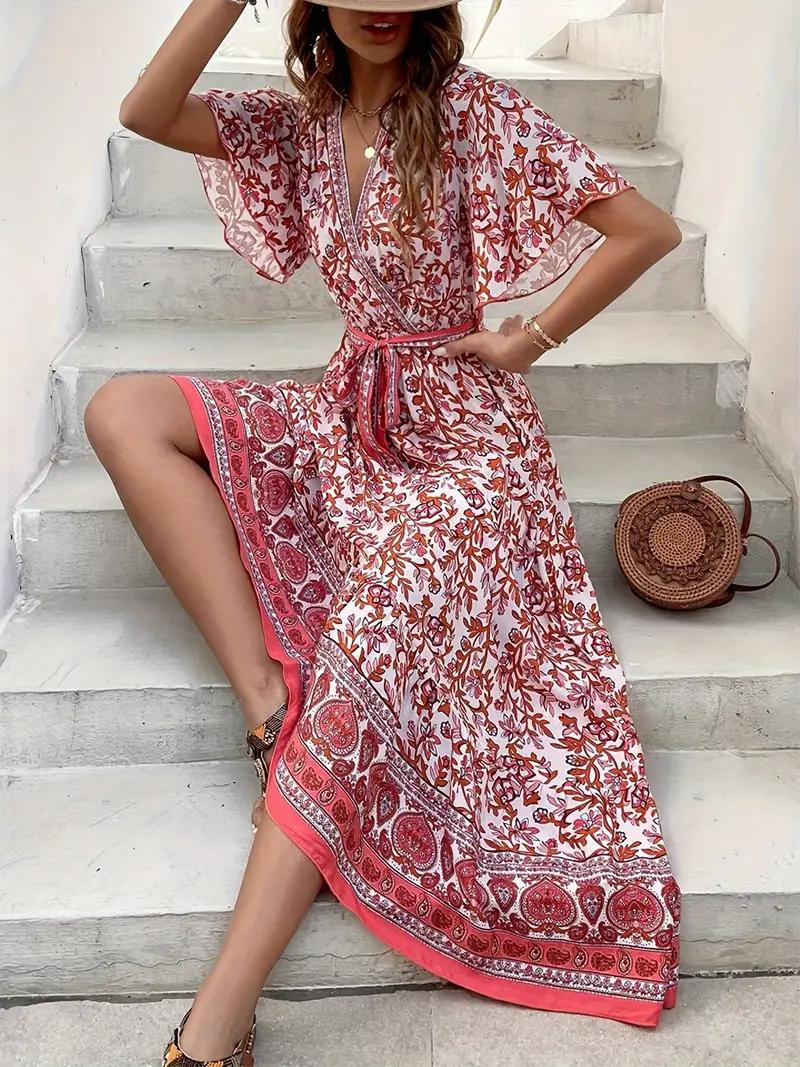 Abito Maxi Floreale con Scollo a V e Vita Annodata, Design Fluido per Vacanze Estive e Stile Bohemian-82359-977732dd-4424-4f15-a1fb-9efdc651999a