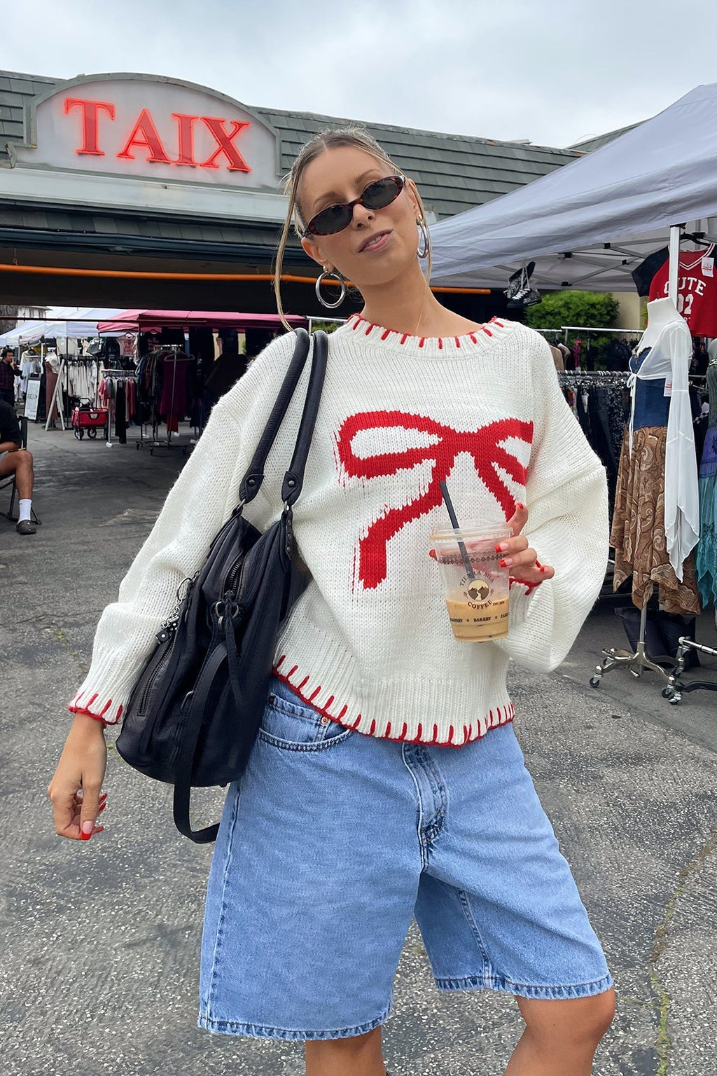 Maglia Chic con Fiocco Rosso