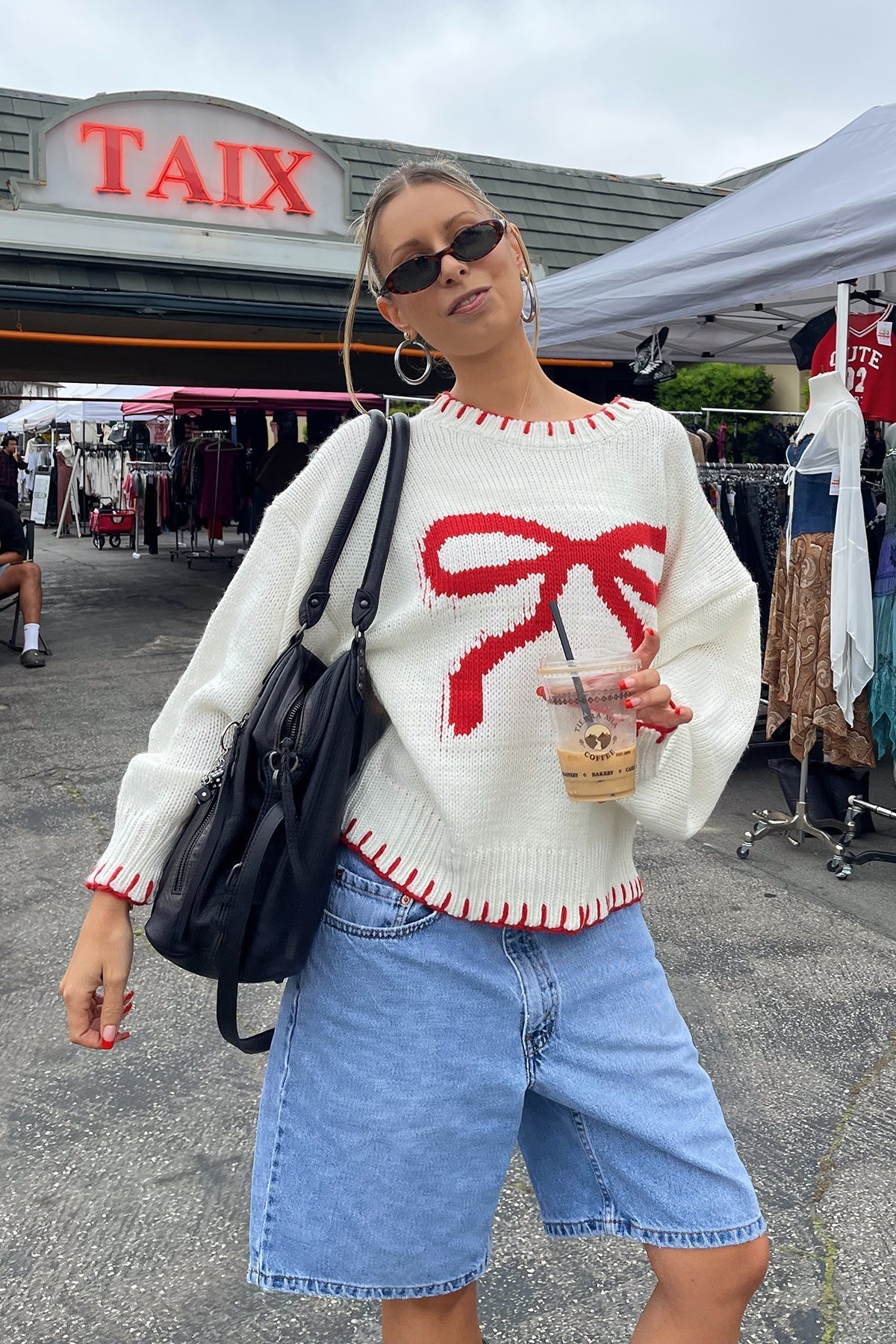 Maglia Chic con Fiocco Rosso